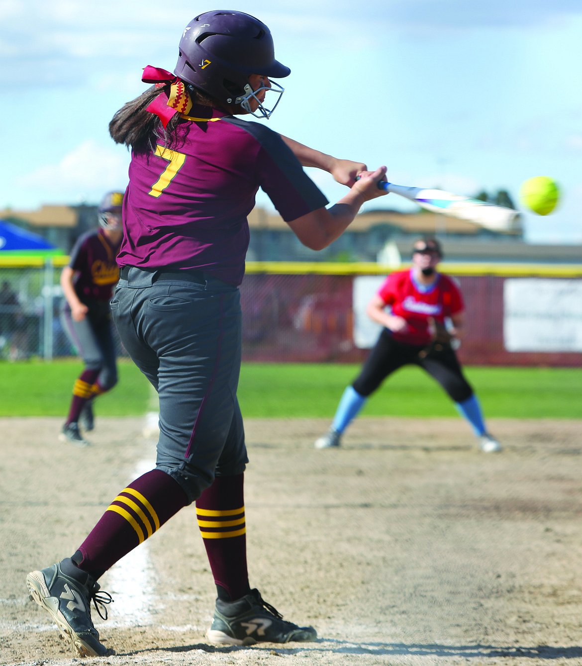 Connor Vanderweyst/Columbia Basin Herald
Moses Lake third baseman Madison Olson connects on a pitch against Eastmont.