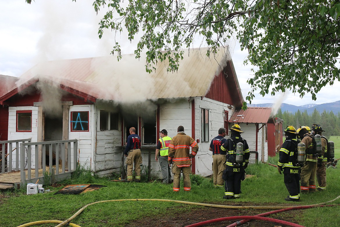 Photo by MANDI BATEMAN
Firefighters waiting their turn to take place in one of the many training exercises.