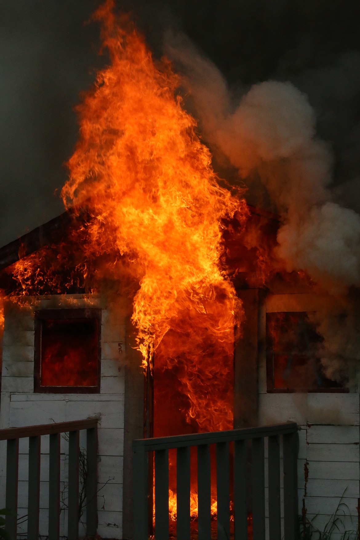 Photo by MANDI BATEMAN
Scenes from the burning house on May 19, during the live burn training consisting of multiple agencies.