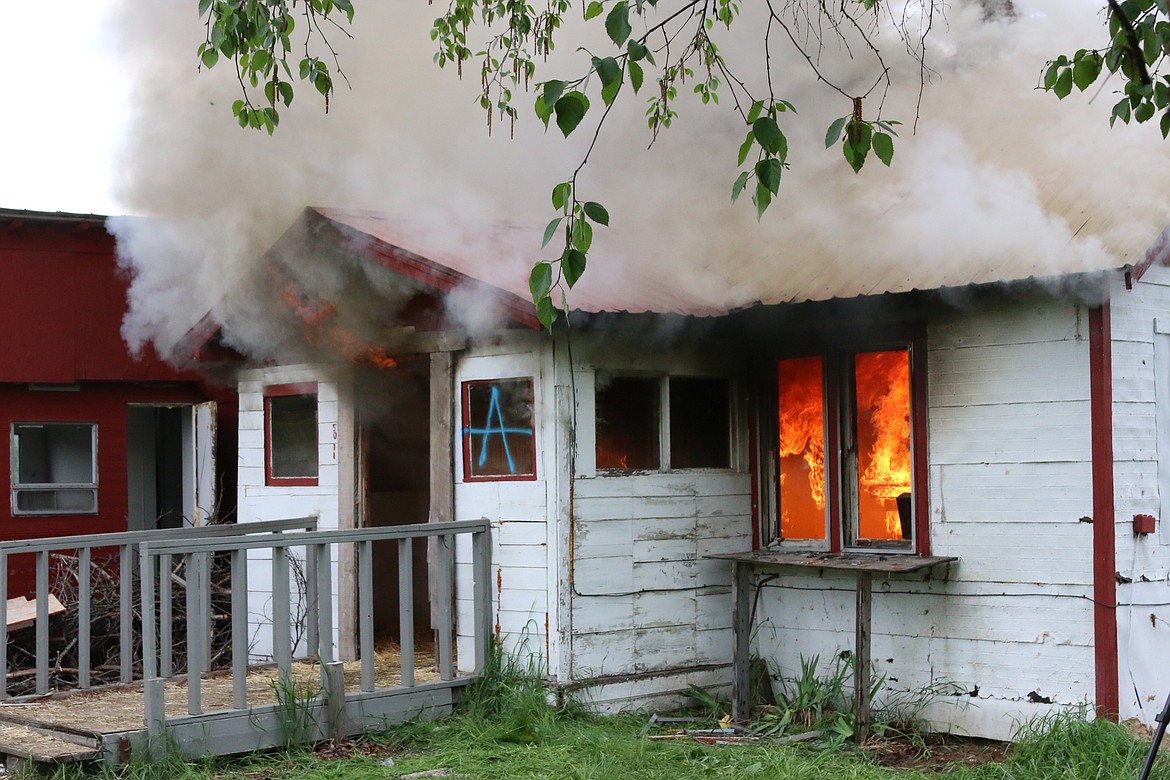 Photo by MANDI BATEMAN
Scenes from the burning house on May 19, during the live burn training consisting of multiple agencies.