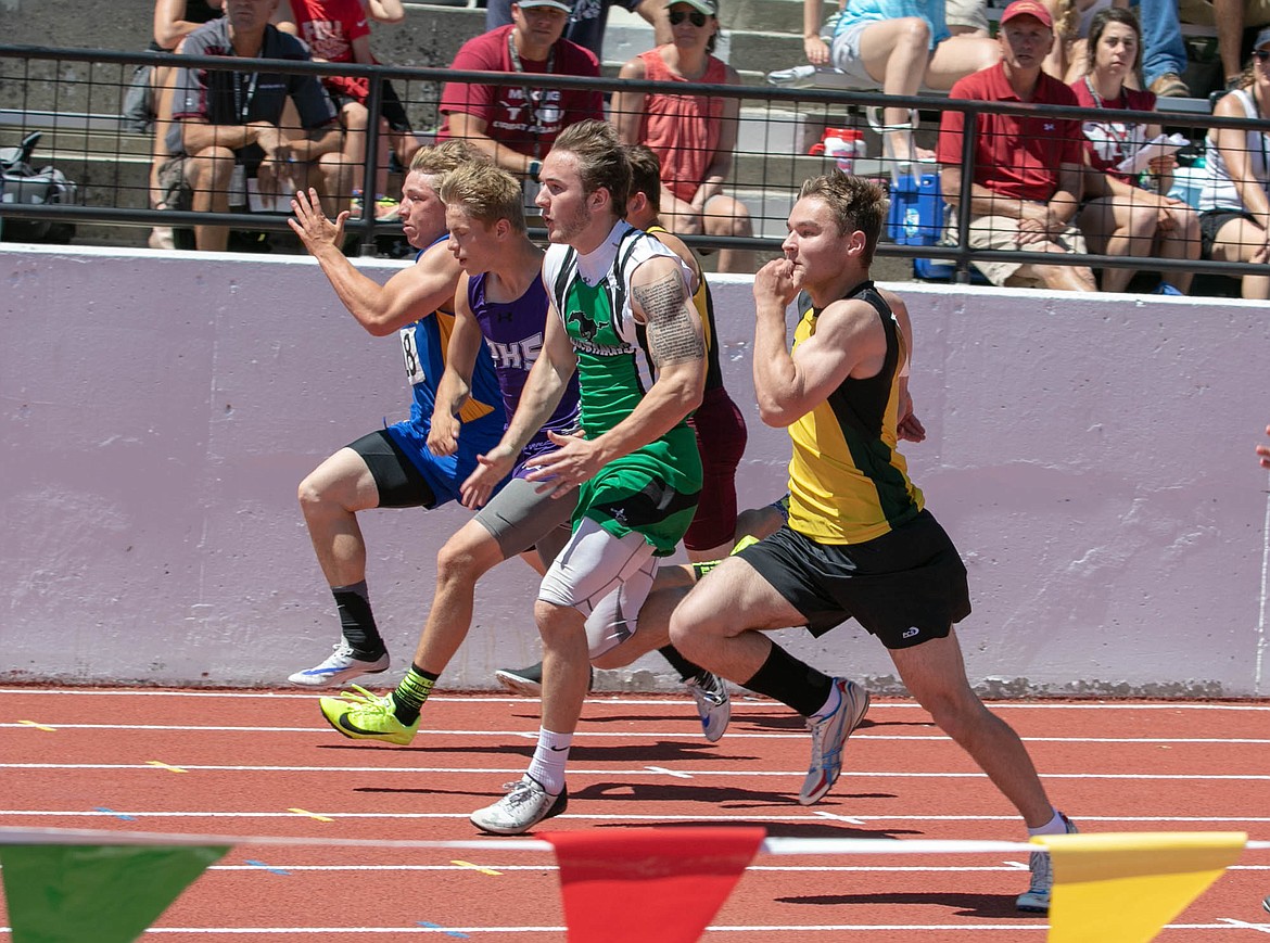 St. Regis sprinter Ian Farris competes in the preliminaries of the 100 meter dash Friday afternoon. Farris qualified for finals and took second place overall at the state track meet. (Photo by Kylie Richter/Special to the Mineral Independent)