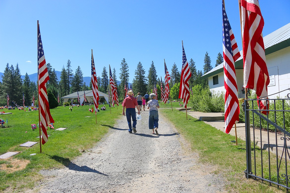 Photo by MANDI BATEMAN
Flags lining the driveway.