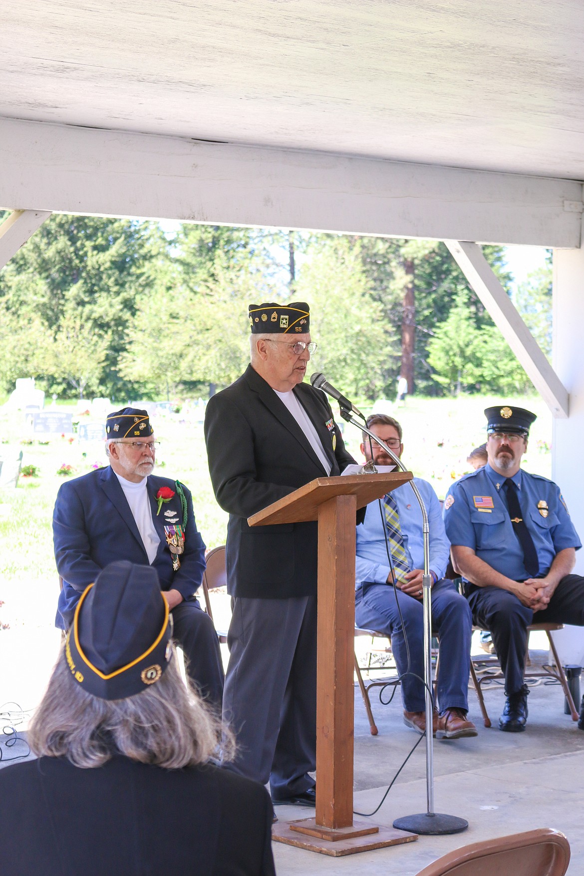 Photo by MANDI BATEMAN
American Legion Treasurer John Tucker reading the Roll Call of the Fallen.