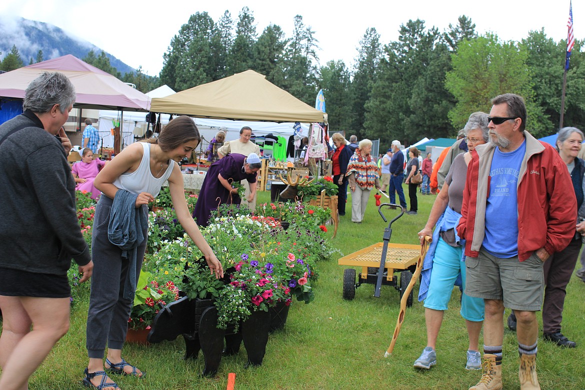 Up to 4,000 people attend the three-day annual flea market held in St. Regis with nearly 200 vendors.