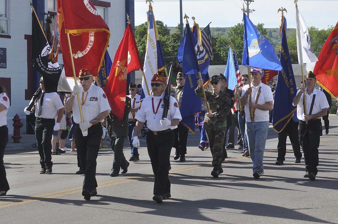 VETERANS MARCH in a Memorial Day parade in Polson Monday. (Ashley Fox/Lake County Leader)