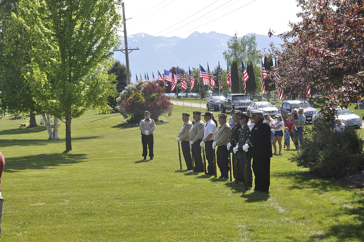 MEMBERS OF THE Honor Guard wait for commands during a Memorial Day ceremony at Lake View Cemetery in Polson. (Ashley Fox/Lake County Leader)