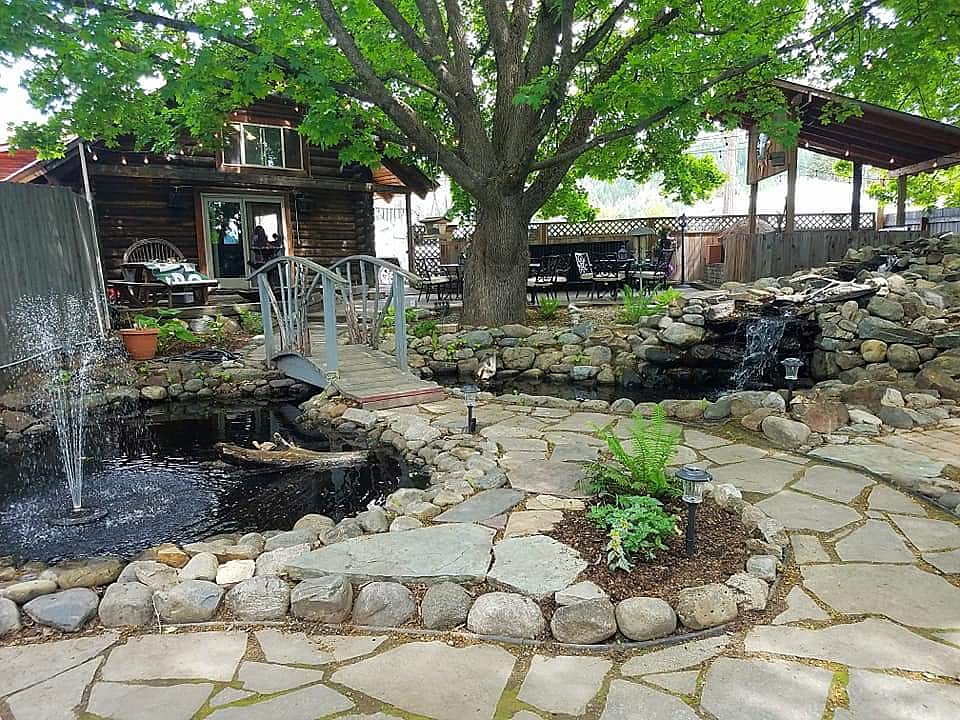 Courtesy photos
The back patio area of the Two Tones Cafe has a secluded garden complete with a waterfall and koi pond.