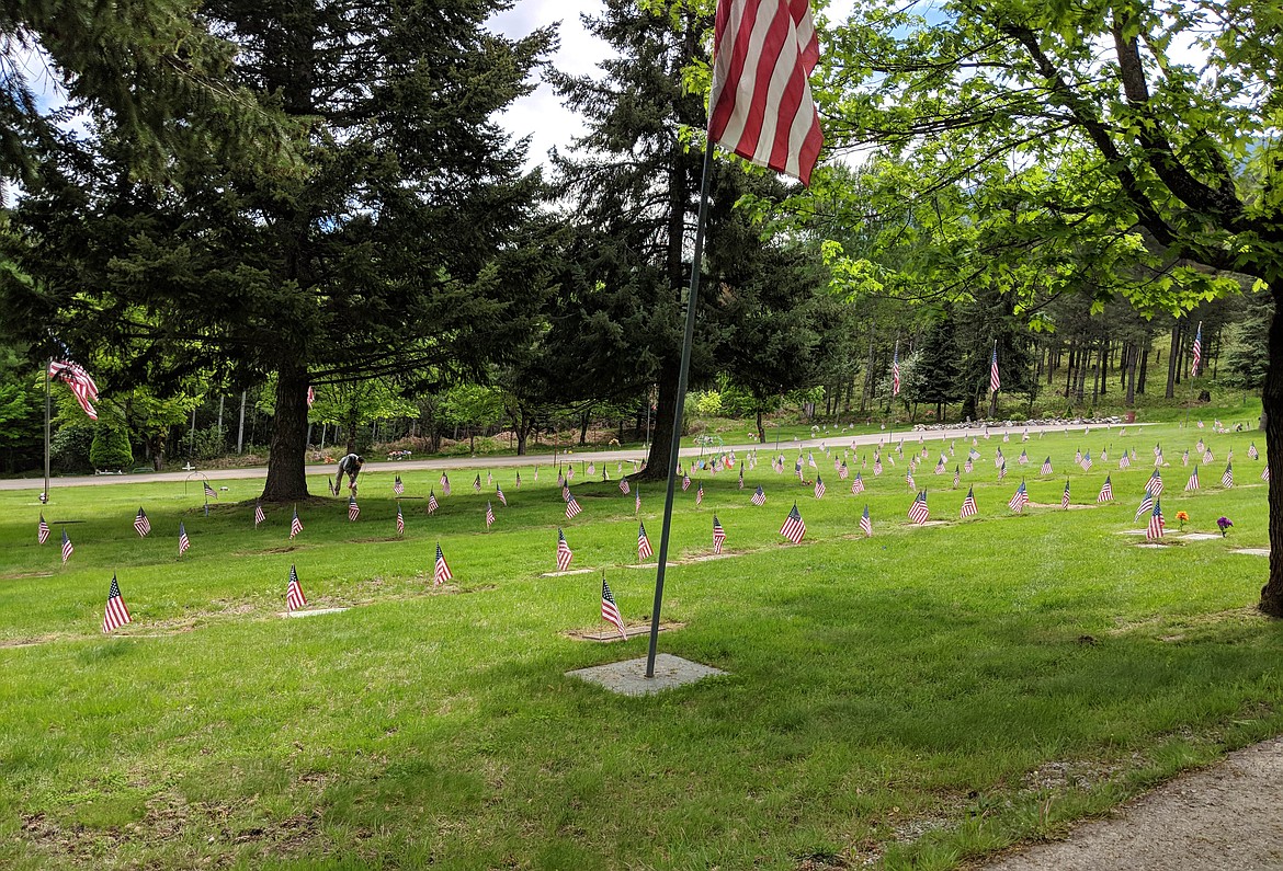 Courtesy photos
Student-cadets from Kellogg High School&#146;s Marine Corps JROTC program placed flags at the gravesites of the veterans buried at Greenwood Cemetery as part of their annual Memorial Day community service.