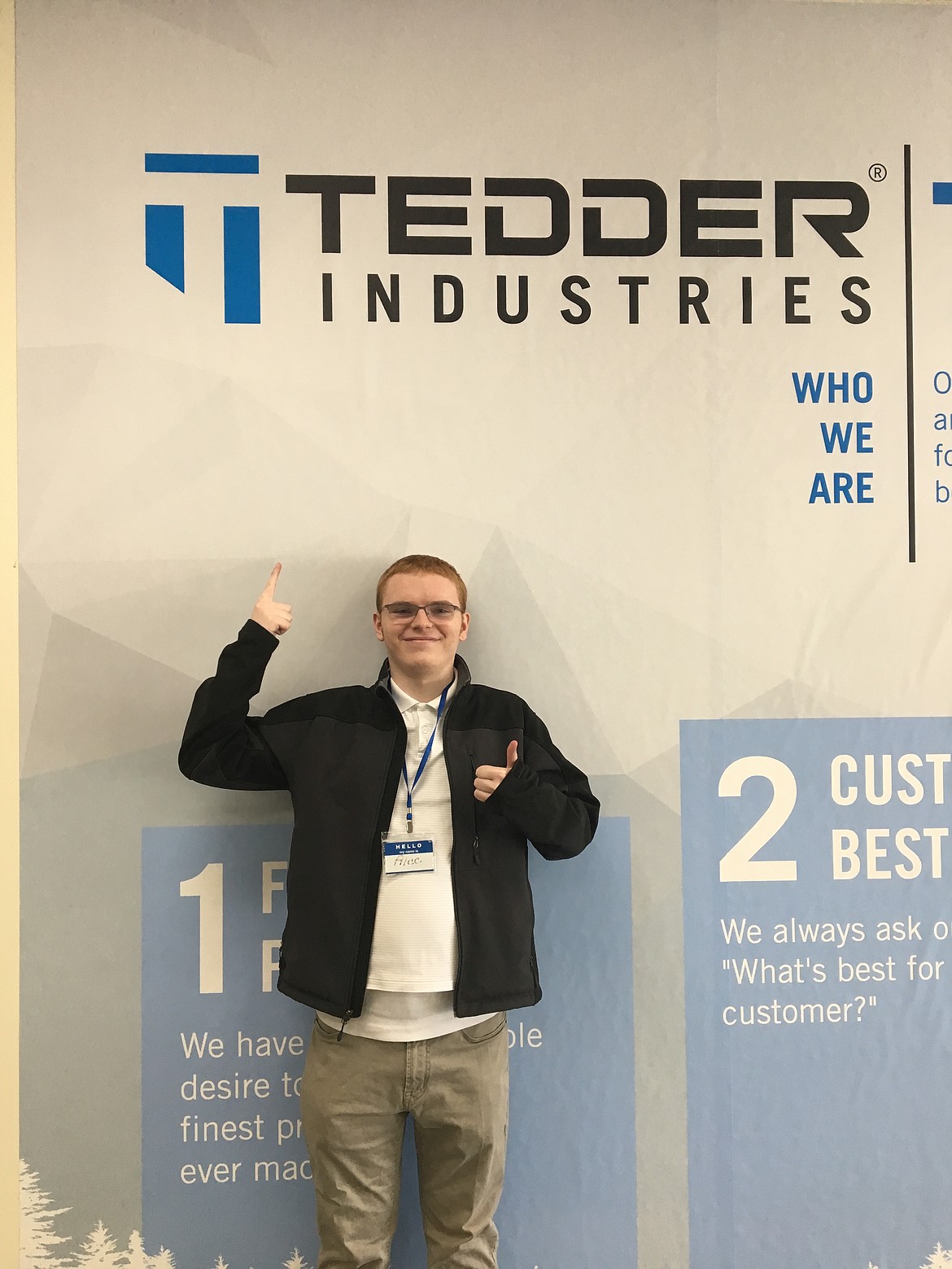 Alec Hurlocker, 20, was hired as a production line team member at Tedder Industries in Post Falls before he even graduated from Project SEARCH, which held its commencement ceremony Wednesday. The Lake City High School grad is pictured here during his May 23 orientation with the company. (Courtesy photo)