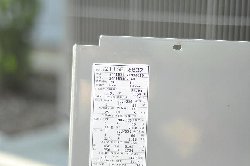 The information sticker on the outside of a unit will tell you what type of refrigerant is used. This homeowner's system uses R410A. (Courtesy photo)