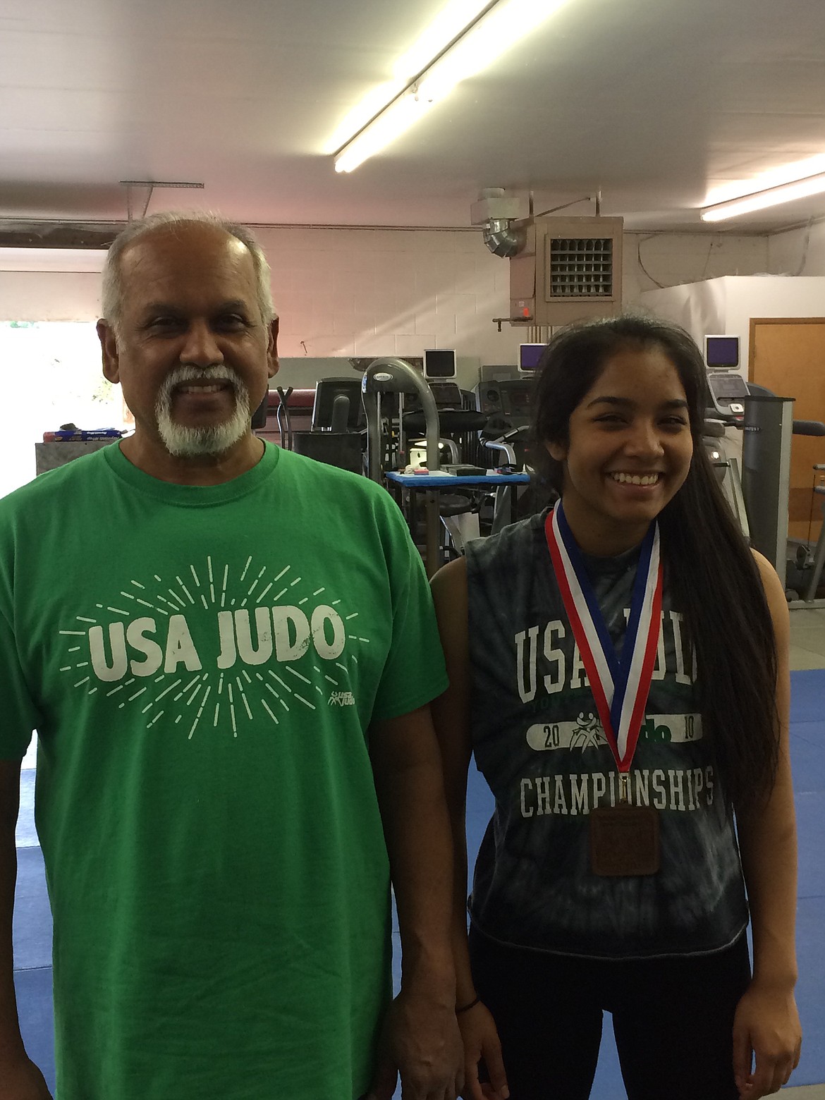 Courtesy photo
Raji Singh, right, a Goshin Jitsu student of Forge Fitness in Post Falls, earned a bronze medal at the Inland Empire Judo Classic on May 26 in Spokane. At left is her instructor, Bijay Singh.