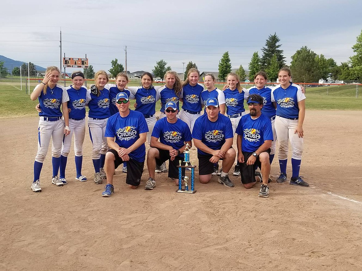 Courtesy photo
The Coeur d&#146;Alene Crush 04 softball team finished second to Kaizen of Calgary, Alberta, in the Crush 14-and-under tournament last weekend at Post Falls High School. Matea Dorame went 17 for 22 for the weekend registering one homer, two triples and six doubles.
In pool play games, the Crush beat the Spokane Impact 12-9 on Friday. Alexis Blankenship, Kristine Schmidt and Kailey Cramer each hit two-run doubles. On Saturday, the Crush beat the Post Falls Blast 16-4. Matea Dorame and Kaylyn Rice both hit two-run triples as well as RBI doubles, and Catherine Bakken hit an RBI double. The Crush beat the Montana Sparks 11-4. Alexis Blankenship hit a two-run home run. In bracket play on Sunday, the Crush beat the Orange Crush of Post Falls 9-7. Matea Dorame and Kailey Cramer hit two doubles each. The Crush beat the Montana Sparks 11-10, as Matea Dorame hit a two-run double, and Kristine Schmidt hit an RBI double. In the championship game, the Crush lost 15-11 to Kaizen. Matea Dorame hit a two-run homer for the Crush, and Kailey Cramer had a two-run double. In the front row from left are coaches Tim Rice, Bob Schmidt, Sean Cleave and Mike Dorame; and back row from left, Kaylyn Rice, Madi Cleave,  Kailey Cramer, Kristine Schmidt, Alyssa Krause, Alexis Blankenship,  Brynn Tolzmann, Ally Bell, Kara Lallatin, Catherine Bakken and Matea Dorame.