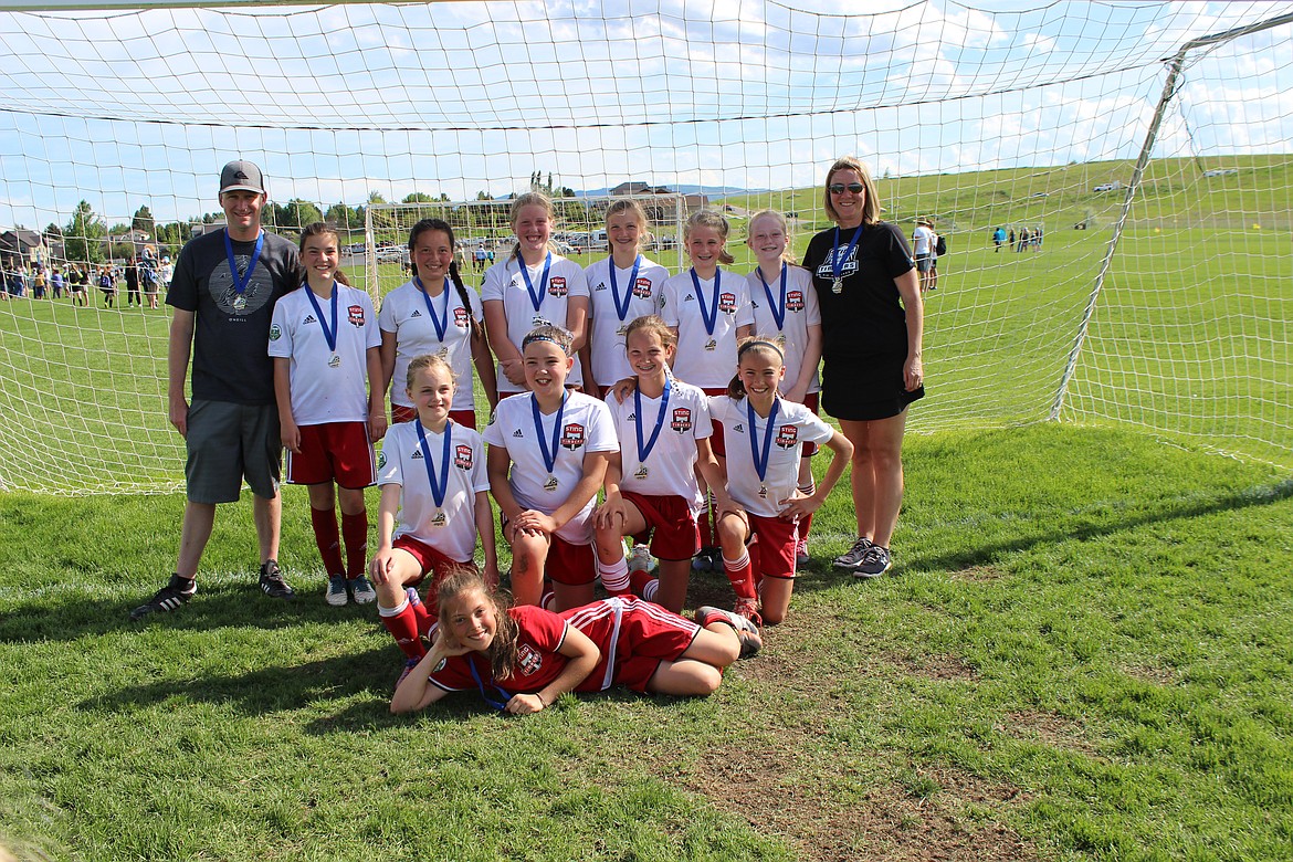 Courtesy photo

The Sting Timbers 06 Girls White soccer team won the U12 girls Silver Division at last weekend's 3 Blind Refs tournament in Kalispell, Mont., beating the Flathead Rapids Black 2006 3-2 in the title game. In the front is Lola Burns; first row from left, Sienna Grant, Katie Focke, Paisley Goings and Ellie Rietze; and back row from left, coach Brian Evans, Maya Lowder, Samantha Rojo, Kelsey Carroll, Kaisa Kent, Caitlin Evans, Hadley Green and coach Michelle Focke.