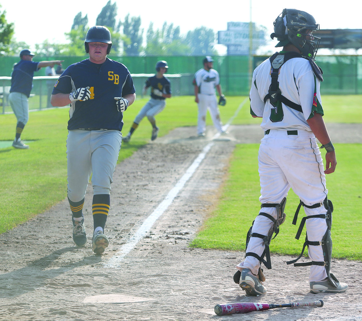 Connor Vanderweyst/Columbia Basin Herald
Southridge runner Brenden Tool comes in to score against Central Washington.