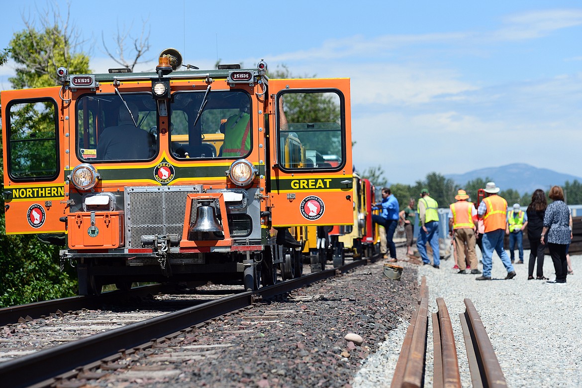 Passengers get back on board during a railcar tour through the Kalispell Core Area on Thursday. (Casey Kreider/Daily Inter Lake)