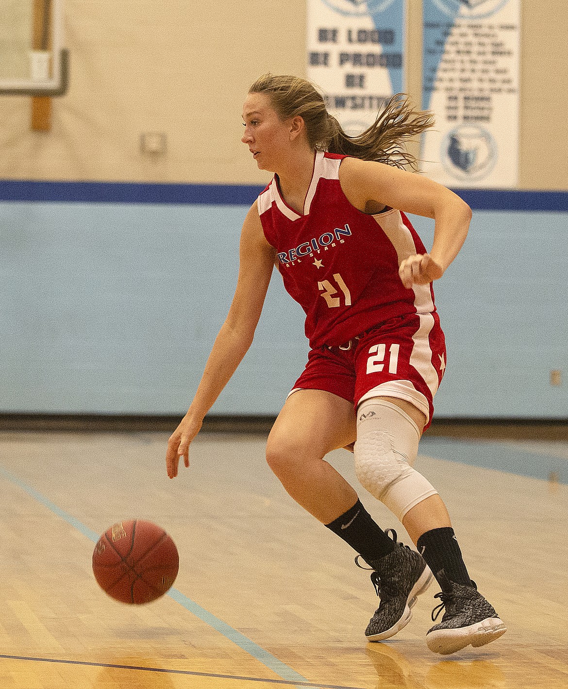 Grace Kirscher of Sandpoint High dribbles the ball and jukes around a Metro All-Star defender.