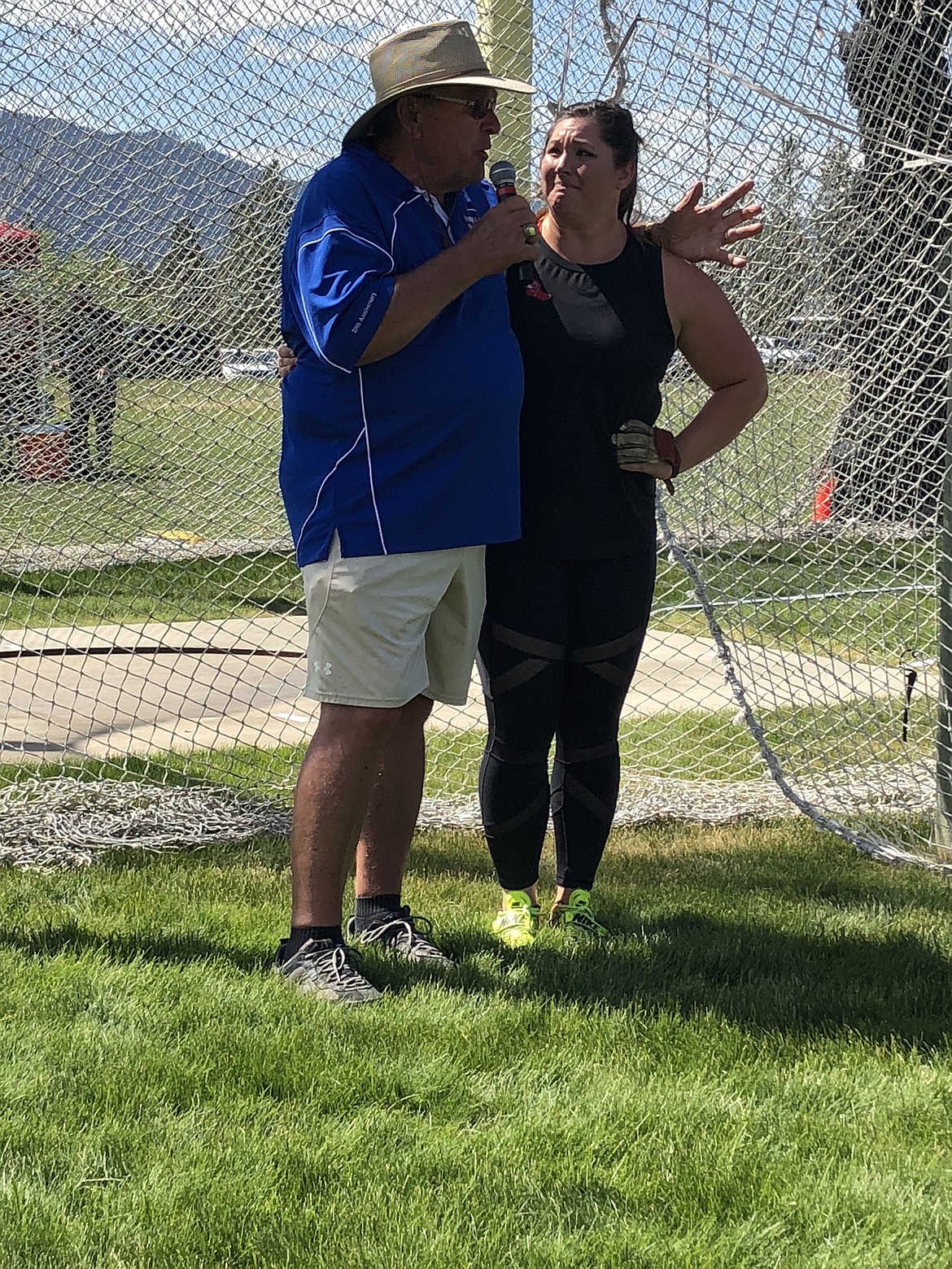 JASON ELLIOTT/Press
Throws guru Bart Templeman congratulates Deanna Price after she broke the women&#146;s hammer throw record during the fourth IronWood Throws Classic on Saturday at the Ironwood Training Center in Rathdrum. Price broke the mark with a throw of 77.65 meters (254 feet, 9 inches).