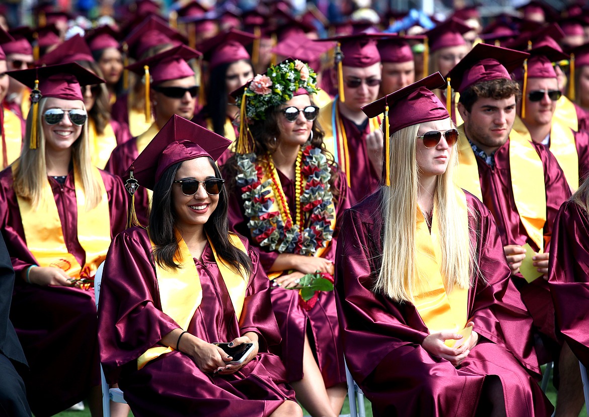 Rodney Harwood/Columbia Basin HeraldMaroon and gold was the color of the day at the Moses Lake graduation on Saturday at Lions Field. But several of the graduating seniors ventured out with their own unique flare and attire.