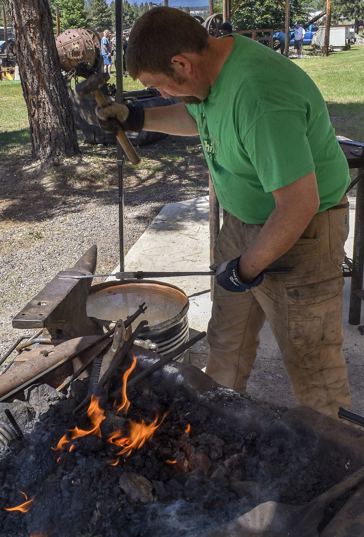 Drew McLaury works on a blanket pin, which he compared to a &#147;giant safety pin&#148; for holding horse blankets in place, among other uses.
(Ben Kibbey/The Western News)