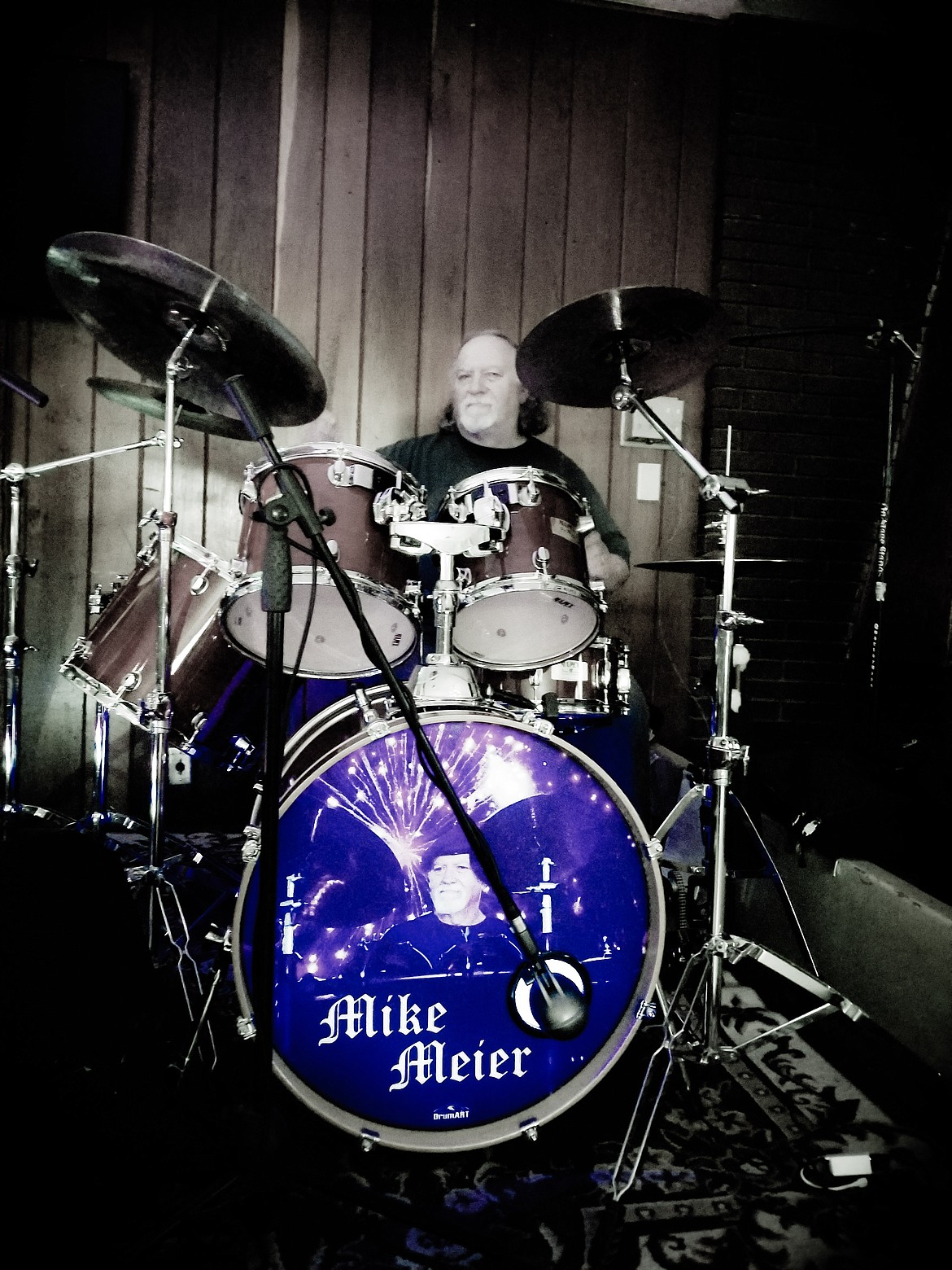 Mike Meier rocking out on the drums at Jacks Club during the Mister E Band&#146;s performance.