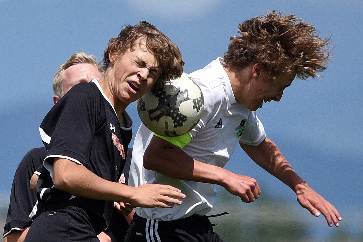 FC Missoula Frenchtown Black 2001B-CL's Aaron Stanicar, left, and Flathead Valley United Green 2002 B-PR's Jalen Hawes battle for a header  at The Buffalo Wild Wings 3 Blind Refs Tournament at Kidsports Complex on Saturday. (Casey Kreider/Daily Inter Lake)