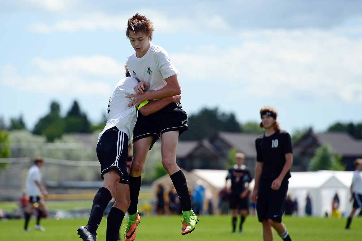 Flathead Valley United Green 2002 B-PR's Daniel Camp, right, celebrates with teammate Jalen Hawes after Camp scored a goal in the first half against FC Missoula Frenchtown Black 2001B-CL at The Buffalo Wild Wings 3 Blind Refs Tournament at Kidsports Complex on Saturday. (Casey Kreider/Daily Inter Lake)