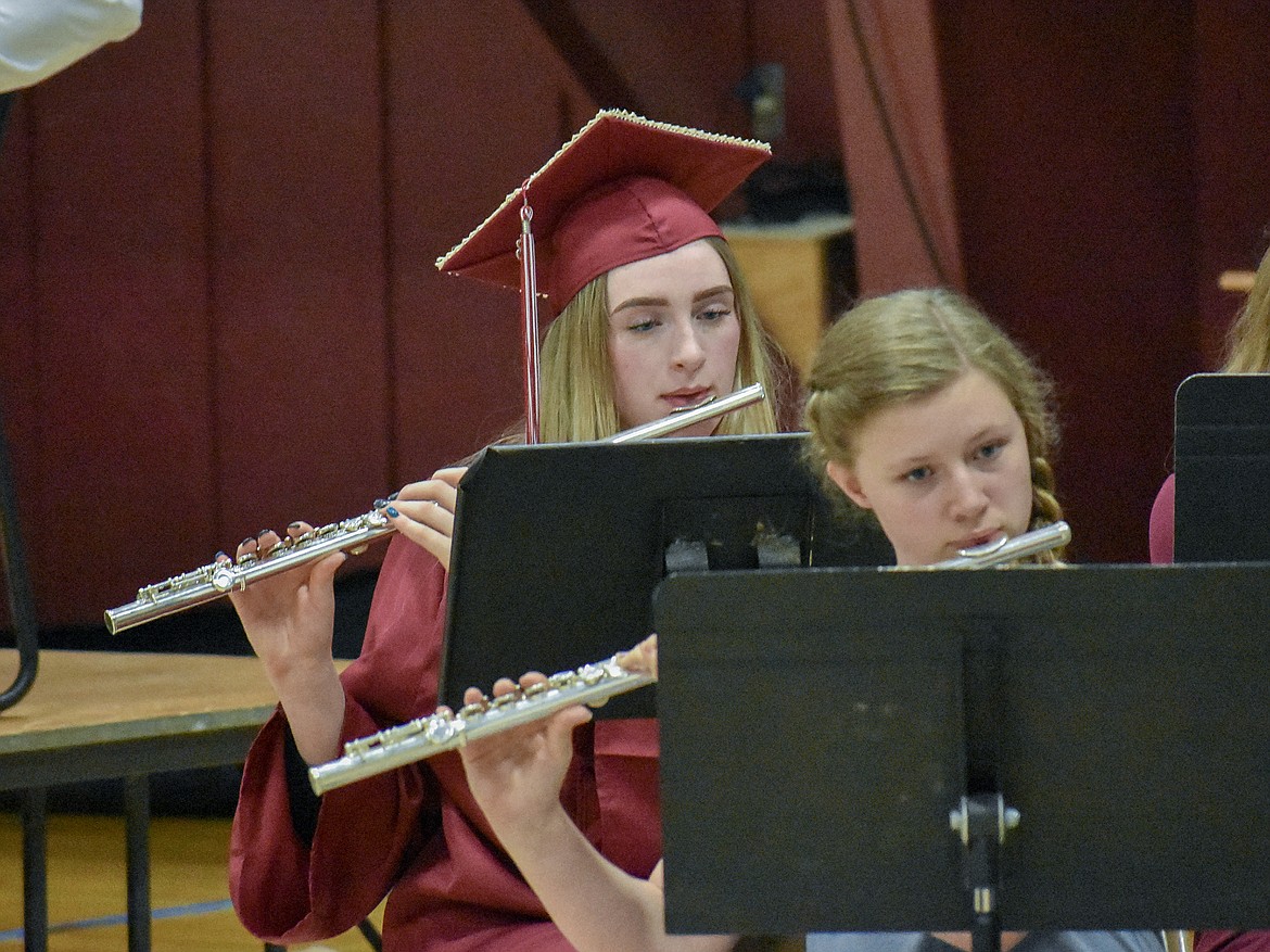 Troy graduate Grace Dolan plays as part of the Troy High School Band performing highlights from Moana, during Troy&#146;s graduation ceremony on Saturday, June 2, 2018. (Ben Kibbey/The Western News)