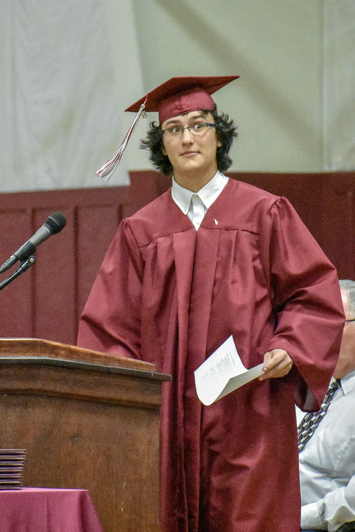 Troy high School graduate Liam Hennsley hammed things up a little before introducing honorary speaker and Troy High School teacher Cory Anderson, at Troy&#146;s graduation ceremony on Saturday, June 2, 2018. (Ben Kibbey/The Western News)