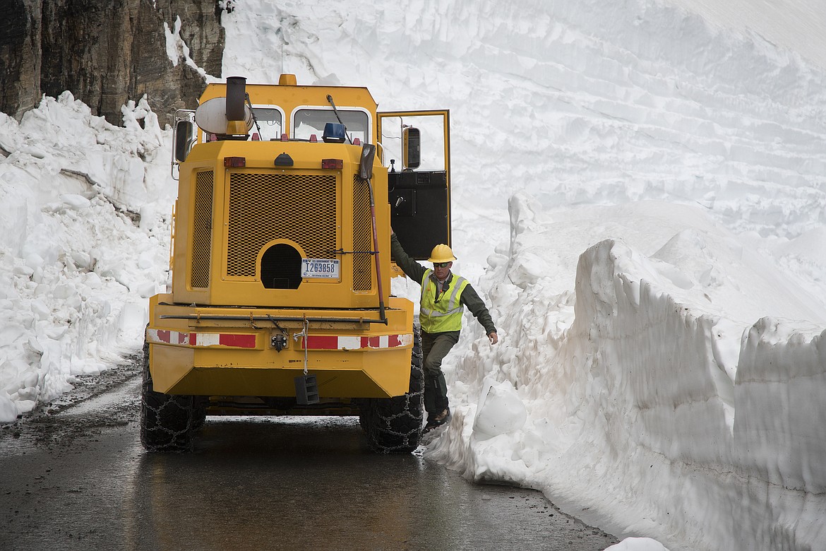 West Lakes Road Work Leader Brian Paul takes a break from working along the Big Drift just west of Logan Pass in Glacier National Park Thursday. (Jeremy Weber photo)