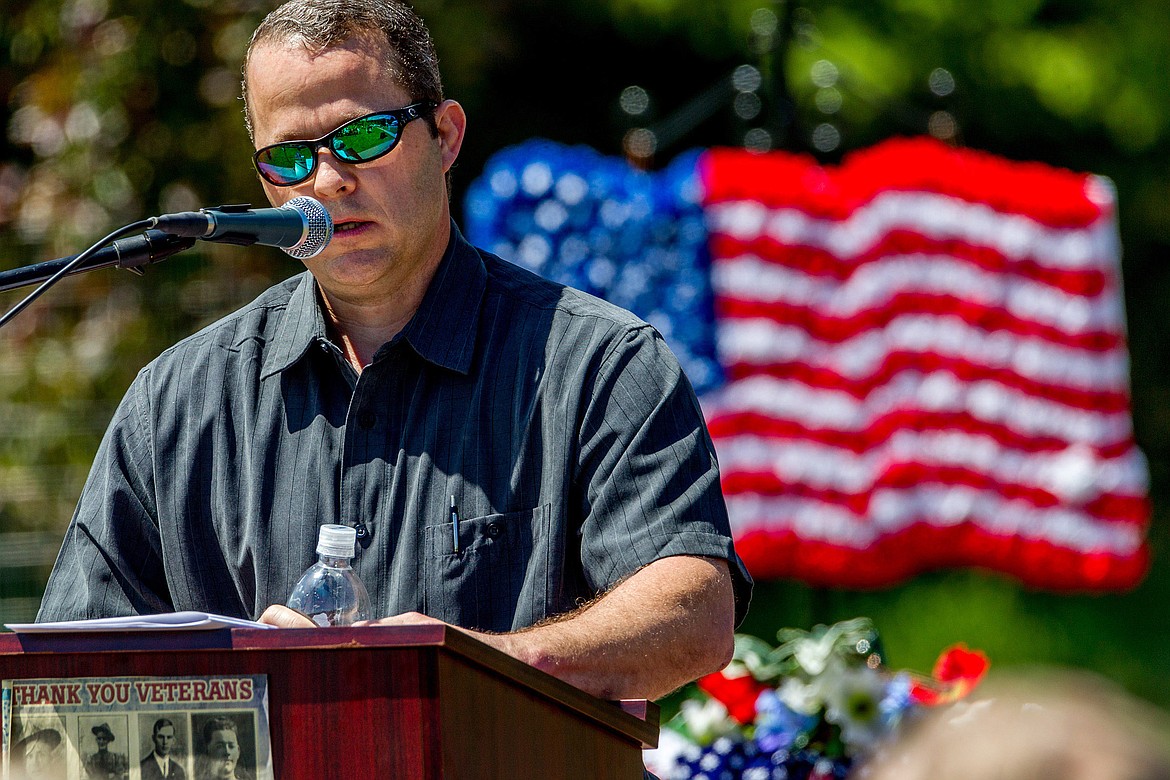Dr. Sterling Rehl of Libby speaks during a Memorial Day service at Riverfront Park in Libby on Monday. Rehl served as a captain in the U.S. Army from 2010 to 2014, and in Afghanistan in 2012. (John Blodgett/The Western News)