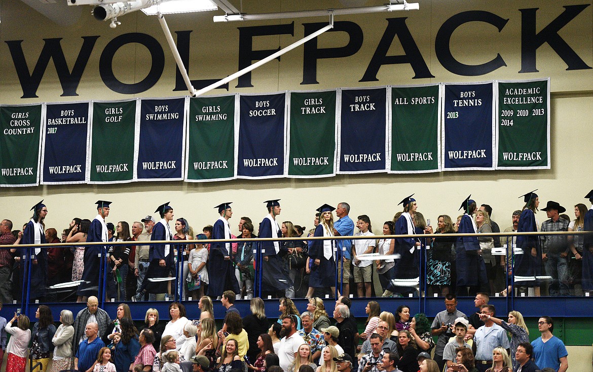 Graduating seniors enter the gymnasium at the Glacier High School Class of 2018 commencement on Saturday. (Casey Kreider/Daily Inter Lake)