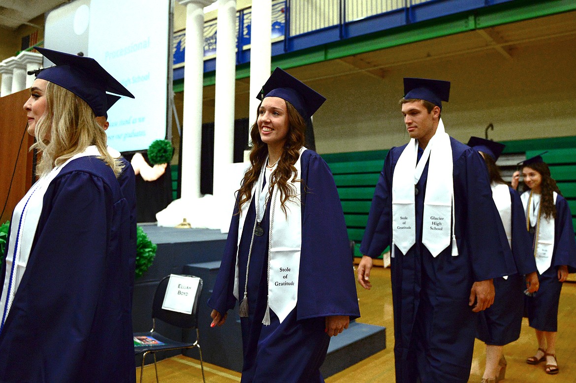 Graduating seniors enter the gymnasium at the Glacier High School Class of 2018 commencement on Saturday. (Casey Kreider/Daily Inter Lake)