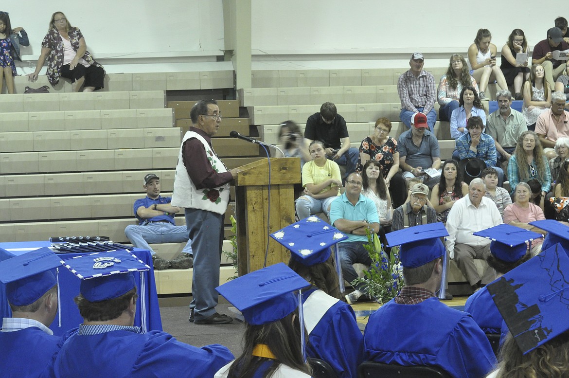 GRADUATING SENIORS, family and friends listen as Joe McDonald gives a speech during the St. Ignatius graduation ceremony Saturday, June 2. (Ashley Fox/Lake County Leader)