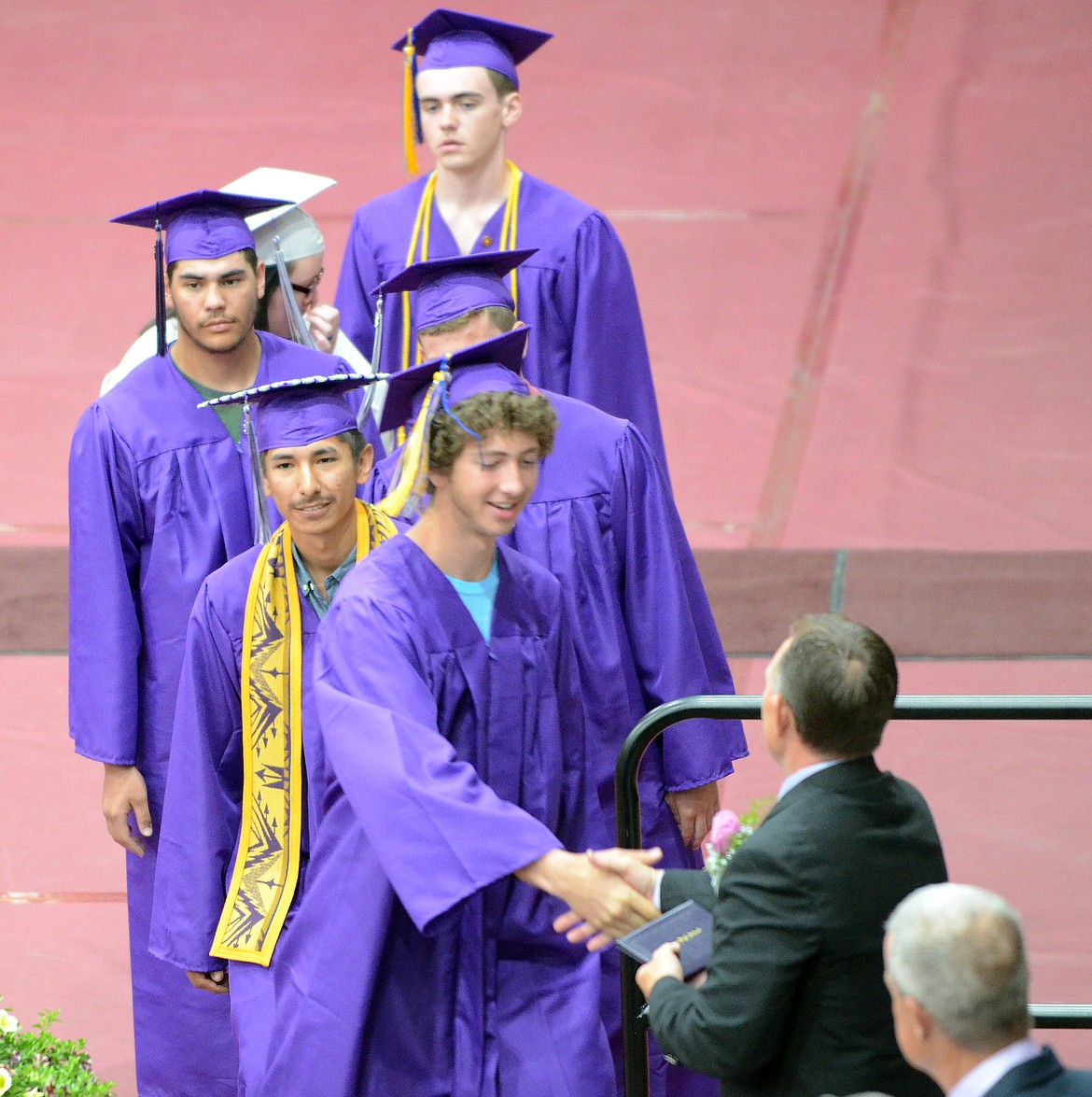 MICHAEL VERGERONT receives his diploma at the Polson High School graduation on Saturday, June 2, at the Joe McDonald Health and Fitness Center at the Salish and Kootenai College Campus in Pablo. (Jason Blasco/Lake County Leader)