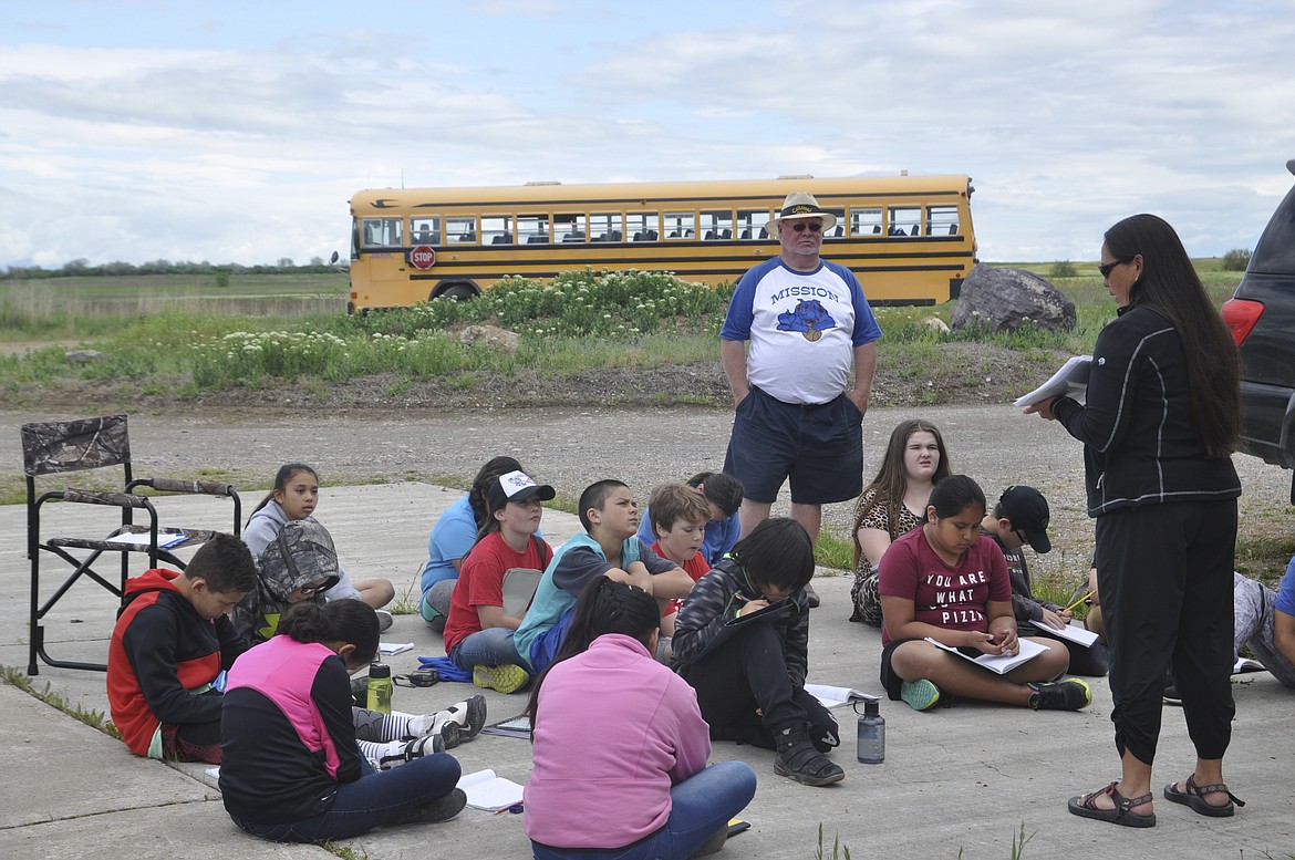 ST. IGNATIUS teacher and coach Lloyd Phillips watches a presentation at the Ninepipe National Wildlife Refuge in Charlo in late May. (Ashley Fox/Lake County Leader)