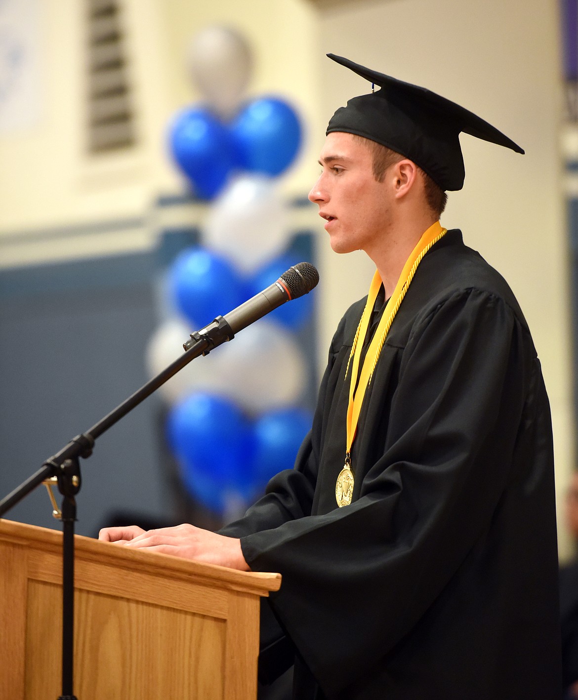 Jared Fetveit gives the Valedictorian address during the commencement ceremony at Stillwater Christian School on Friday night, June 1.(Brenda Ahearn/Daily Inter Lake)