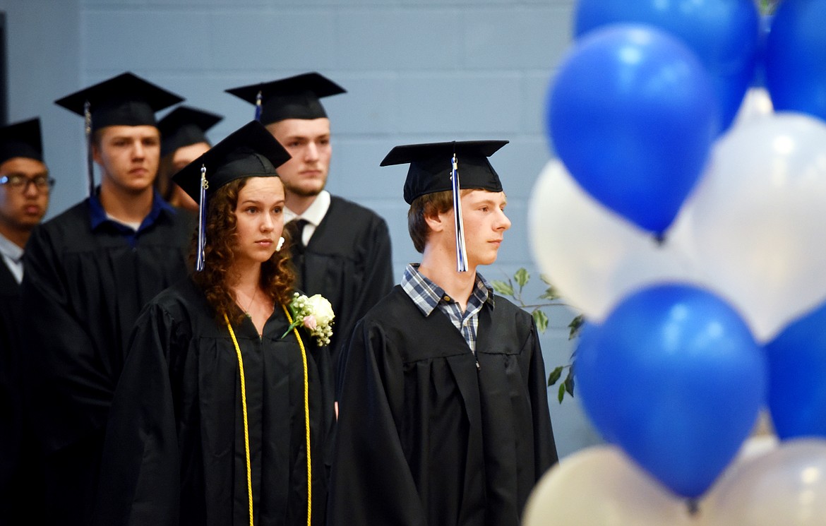 Zane Sutherland and other seniors at Stillwater Christian School begin their processional march at the start of the commencement ceremony on Friday night, June 1.(Brenda Ahearn/Daily Inter Lake)
