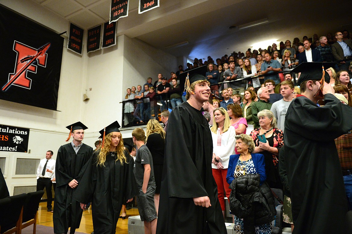 Graduating seniors file into the gymnasium at the Flathead High School Class of 2018 commencement ceremony.