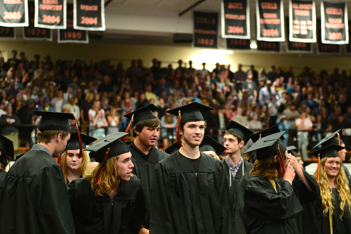 Graduating seniors find their seats at the Flathead High School Class of 2018 Commencement on Friday. (Casey Kreider/Daily Inter Lake)