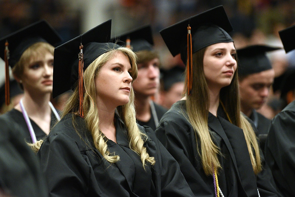 Graduating seniors listen to the opening address by fellow classmate Grace Cady at the Flathead High School Class of 2018 Commencement on Friday. (Casey Kreider/Daily Inter Lake)