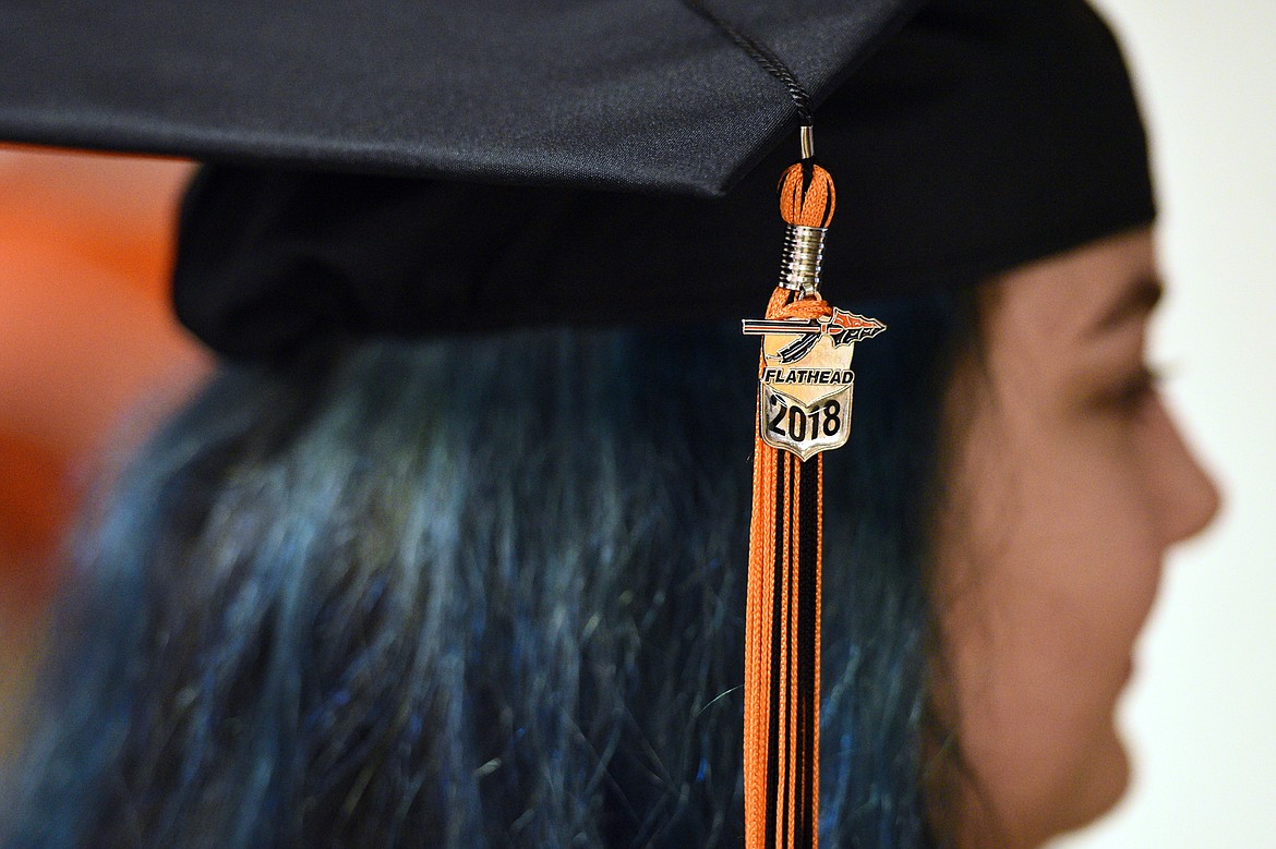 Graduating seniors file into the gymnasium at the Flathead High School Class of 2018 Commencement on Friday. (Casey Kreider/Daily Inter Lake)