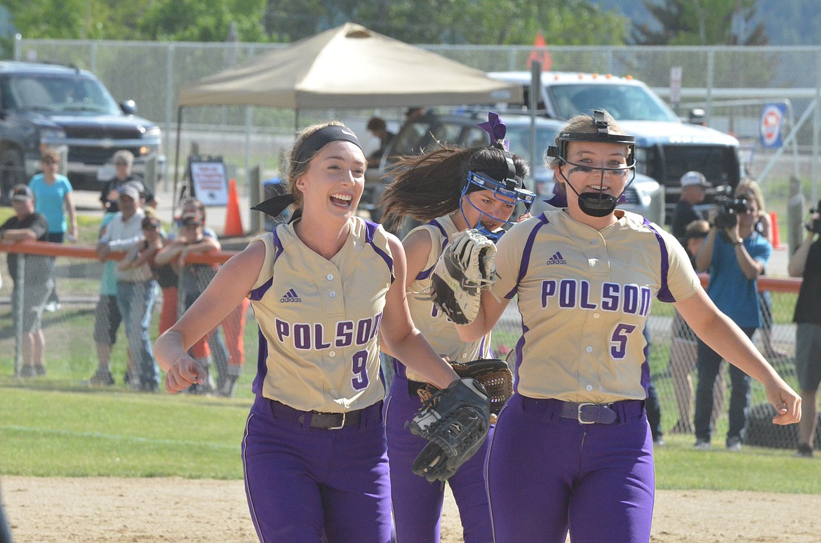 POLSON HIGH School player  Kaelyn Smith (left) and Quinn Motichka (right) celebrate after rallying from a seven-run deficit in the first round of the Class A Montana High School Association state tournament at Frenchtown High School. (photo by Jason Blasco/Lake County Leader)