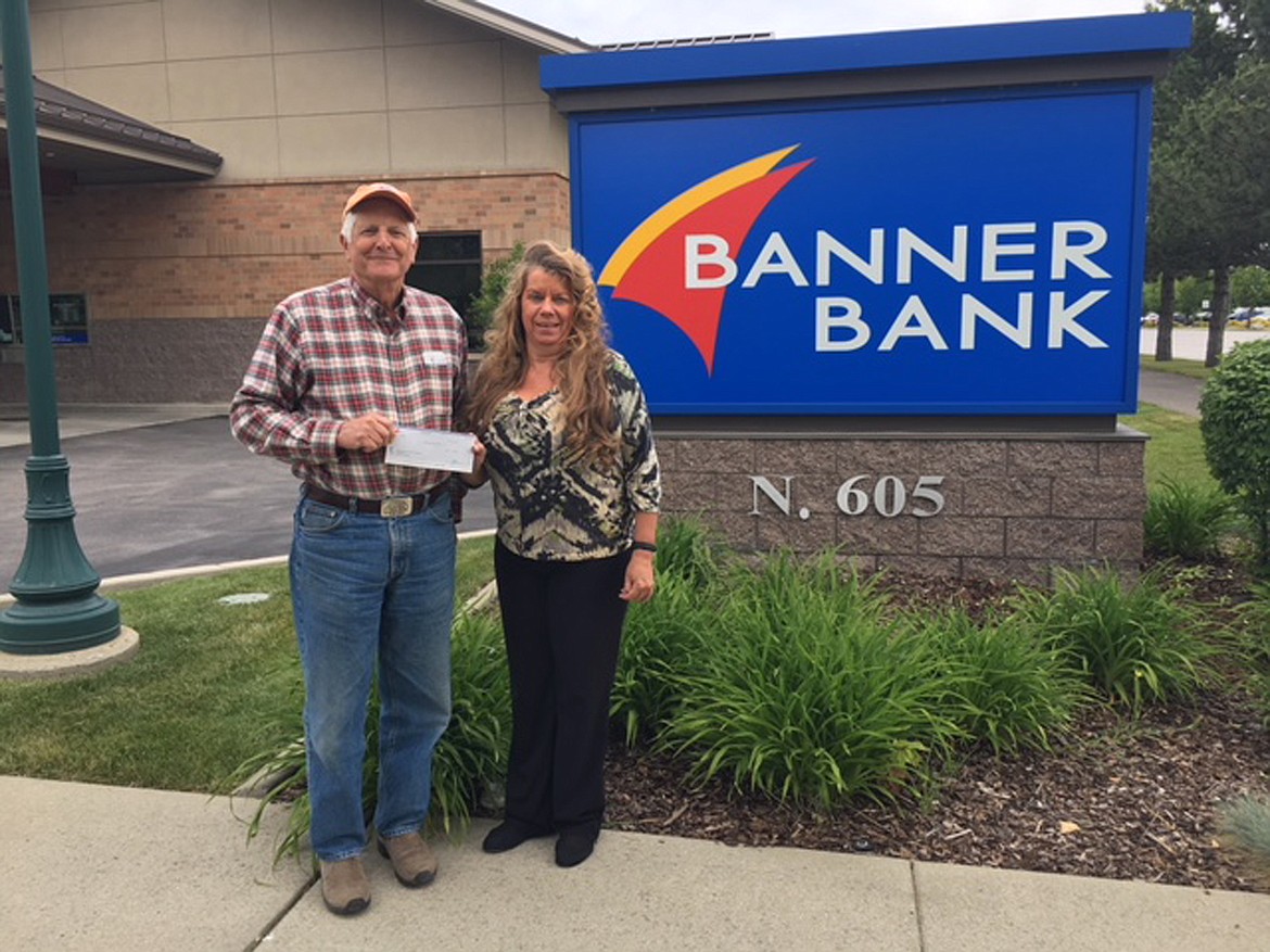 (Courtesy photo)
The Sandpoint office of Banner Bank donated $1,000 to Idaho Panhandle Habitat for Humanity. Pictured are Tim Petersen, left, treasurer at Habitatfor Humanity&#146;s local chapter and Teresa Nelson, branch manager at Banner Bank in Sandpoint.