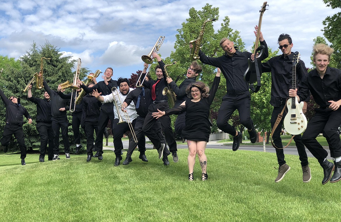 Courtesy photo
Members of the Mataban Jazz Experience leap for joy during a photo shoot ahead of their June 26 show at the Kroc Center in Coeur d&#146;Alene. The 18-year-old director, musician and composer Joseph Mataban, in white, formed the group when he was just a junior at Lake City High School. &#147;It is the most fun thing in the world, getting to teach kids my age and getting them to play all this really, really difficult music. It&#146;s amazing,&#148; Mataban said.