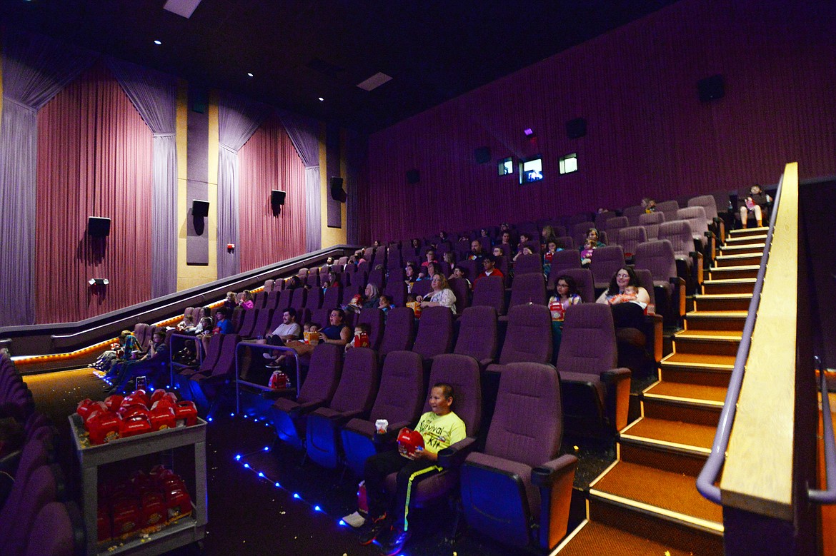 Friends and family attend a sensory showing of the movie &#147;Incredibles 2&#148; at Cinemark Signature Stadium in Kalispell on Saturday morning. (Casey Kreider/Daily Inter Lake)