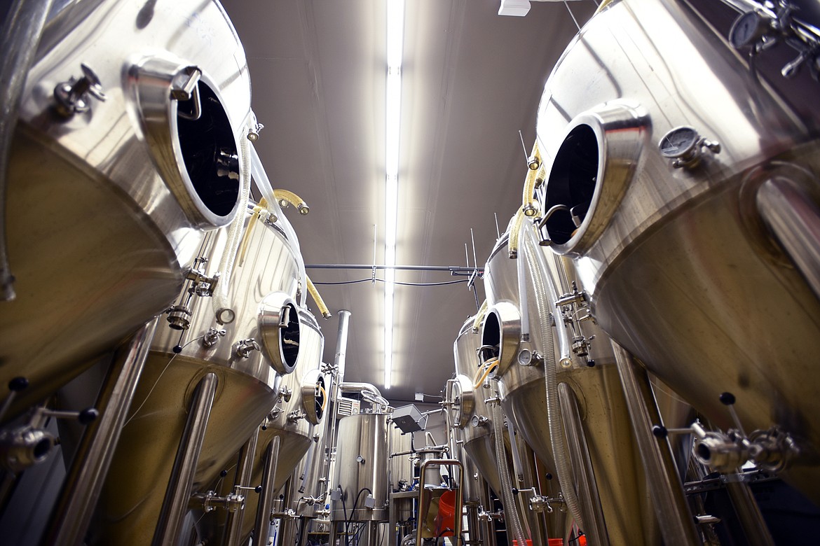 Stainless steel brewing tanks at Bias Brewing in downtown Kalispell.(Brenda Ahearn/Daily Inter Lake)