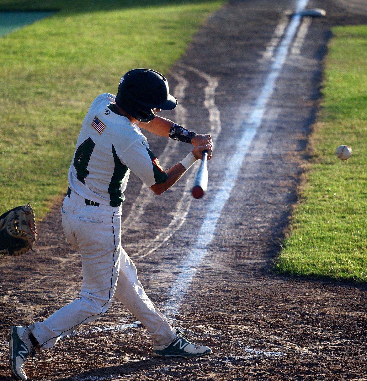 Rodney Harwood/Columbia Basin Herald
Central Washington's Kameron Huberdeau drives a ball back up the middle during the first game of Thursday's AAA American Legion game against the Pepsi-Pak.