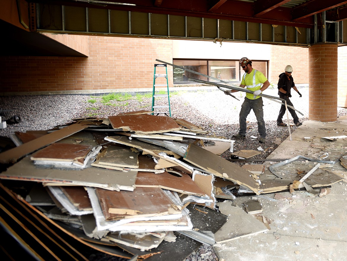 Justin Moler and Matt Johnson of Swank Enterprises do demolition work at Edgerton Elementary on Monday afternoon, June 11, in Kalispell. (Brenda Ahearn/Daily Inter Lake)