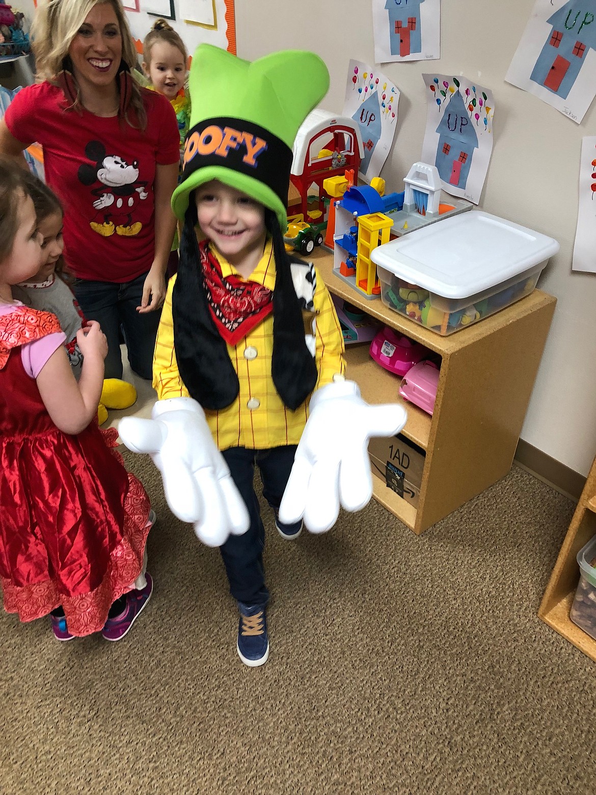 Landon Hill, 4, smiles from as he goofs around in Goofy hat and gloves during his Make-A-Wish Idaho wish reveal at ABCD Daycare in Hayden in February 2017. Landon, a cancer survivor, was granted his wish to go to Disney World through Make-A-Wish Idaho, a nonprofit that helps dreams come true for kids experiencing life-threatening conditions. The organization is in need of volunteer wish granters to help make these dreams happen. &quot;He was having a lot of fun that day,&quot; said wish granter Blaine Eckles. &quot;Such joy.&quot; (Courtesy photo)