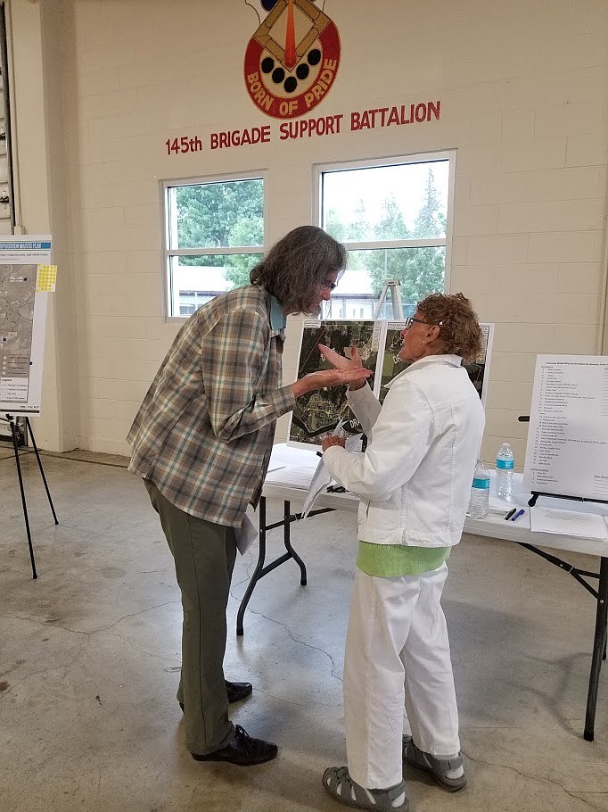 (Photo by MANDI BATEMAN)
Idaho Smart Group Program Coordinator Elaine Clegg talks with Marciavee Cossette at the booth that gave information about bicycle and pedestrian paths.